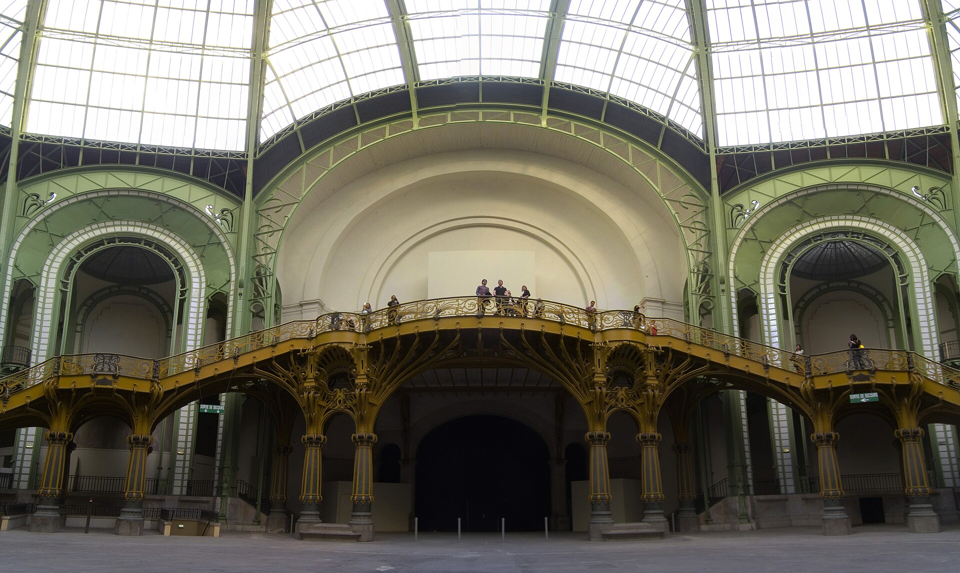 Real photograph of the glass roof and ornate interior of the Grand Palais in Paris