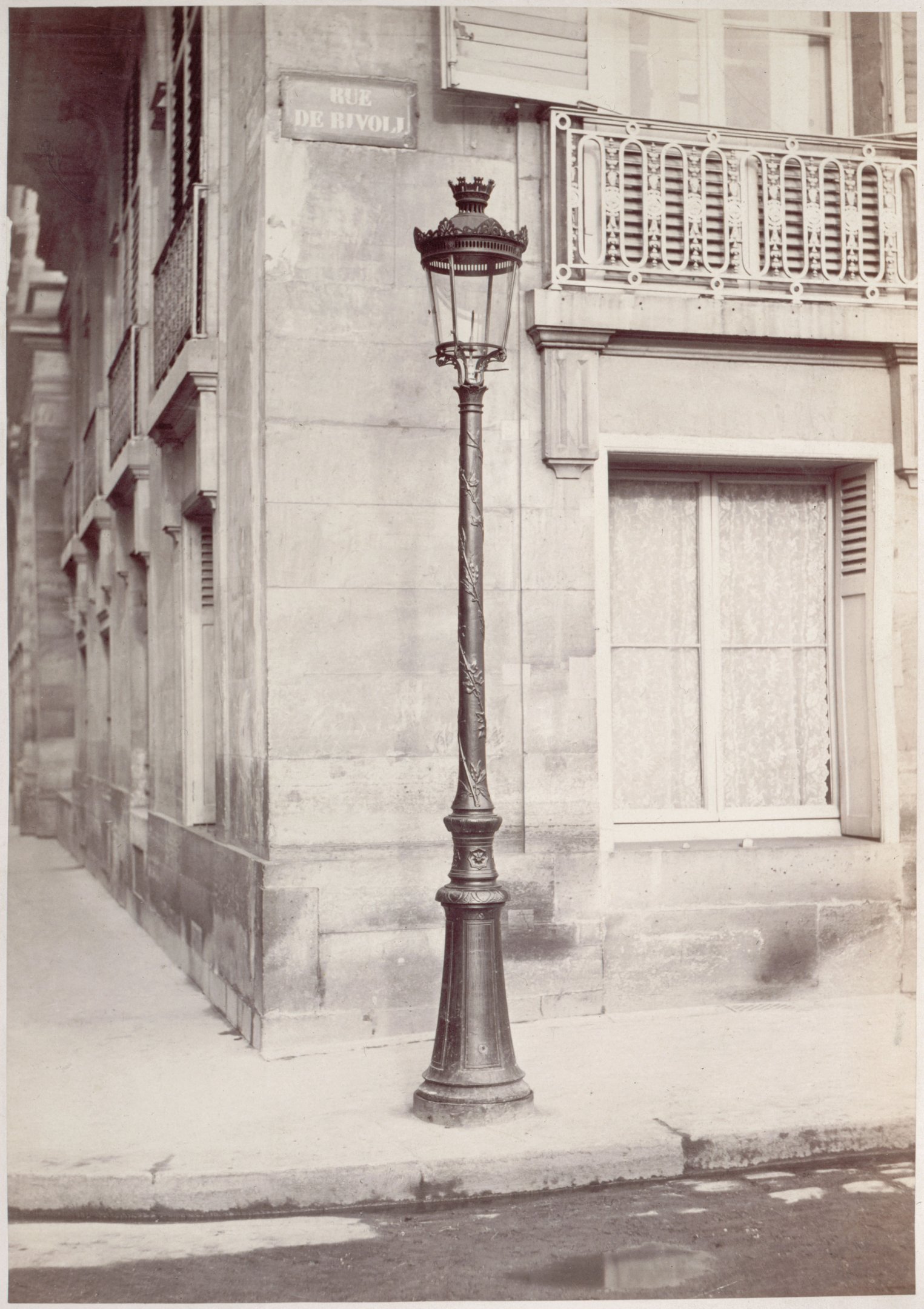 Ornate nineteenth-century gas lamp at Rue de Rivoli and Rue Saint-Florentin