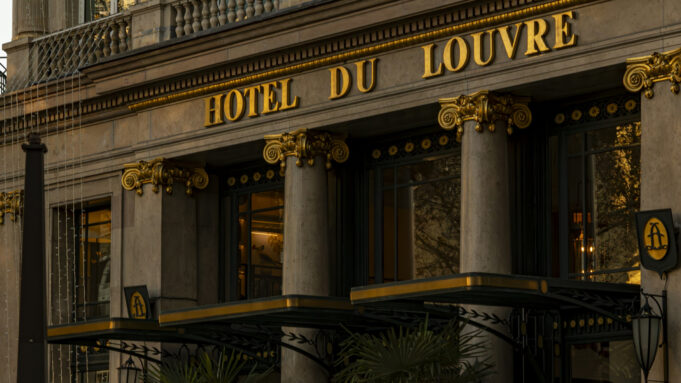 Hotel du Louvre entrance in central Paris Guests arriving at the Hotel du Louvre entrance in central Paris