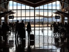 If You Want to Understand a Country, Look at Its Airport Real photograph of passengers of different backgrounds moving through an airport terminal