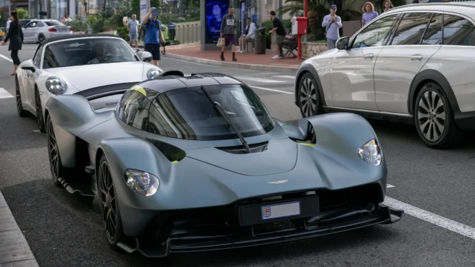 Aston Martin Valkyrie and luxury cars on a Monaco street