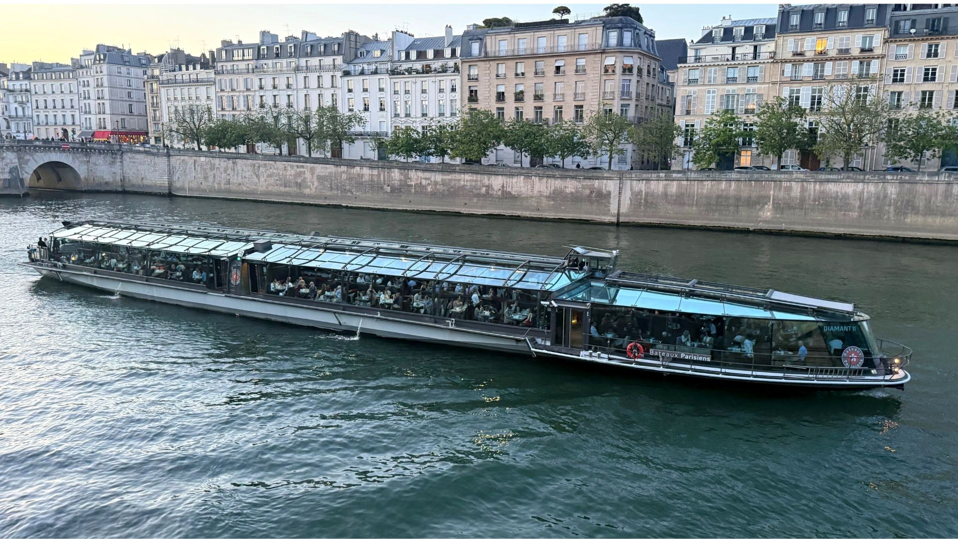 Modern glass dinner boat on the Seine