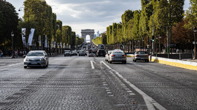 Which Paris area should you stay in Champs-Élysées leading to the Arc de Triomphe in Paris