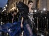 Paris Fashion Week 2026 Without an Invitation: Livestreams, Public Events and the Streets to Watch Avant-garde model in sculptural silver, black and cobalt fashion outside a Paris show