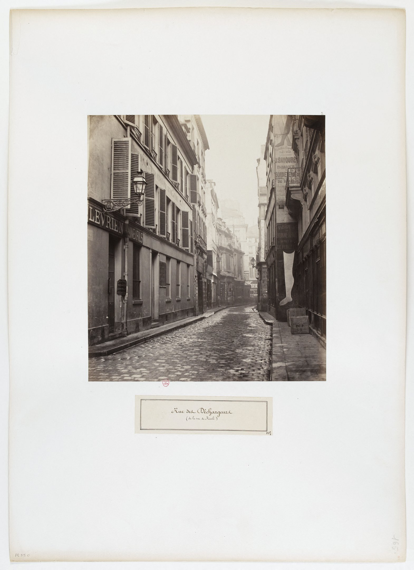 Narrow Rue des Déchargeurs viewed from Rue de Rivoli between 1865 and 1868