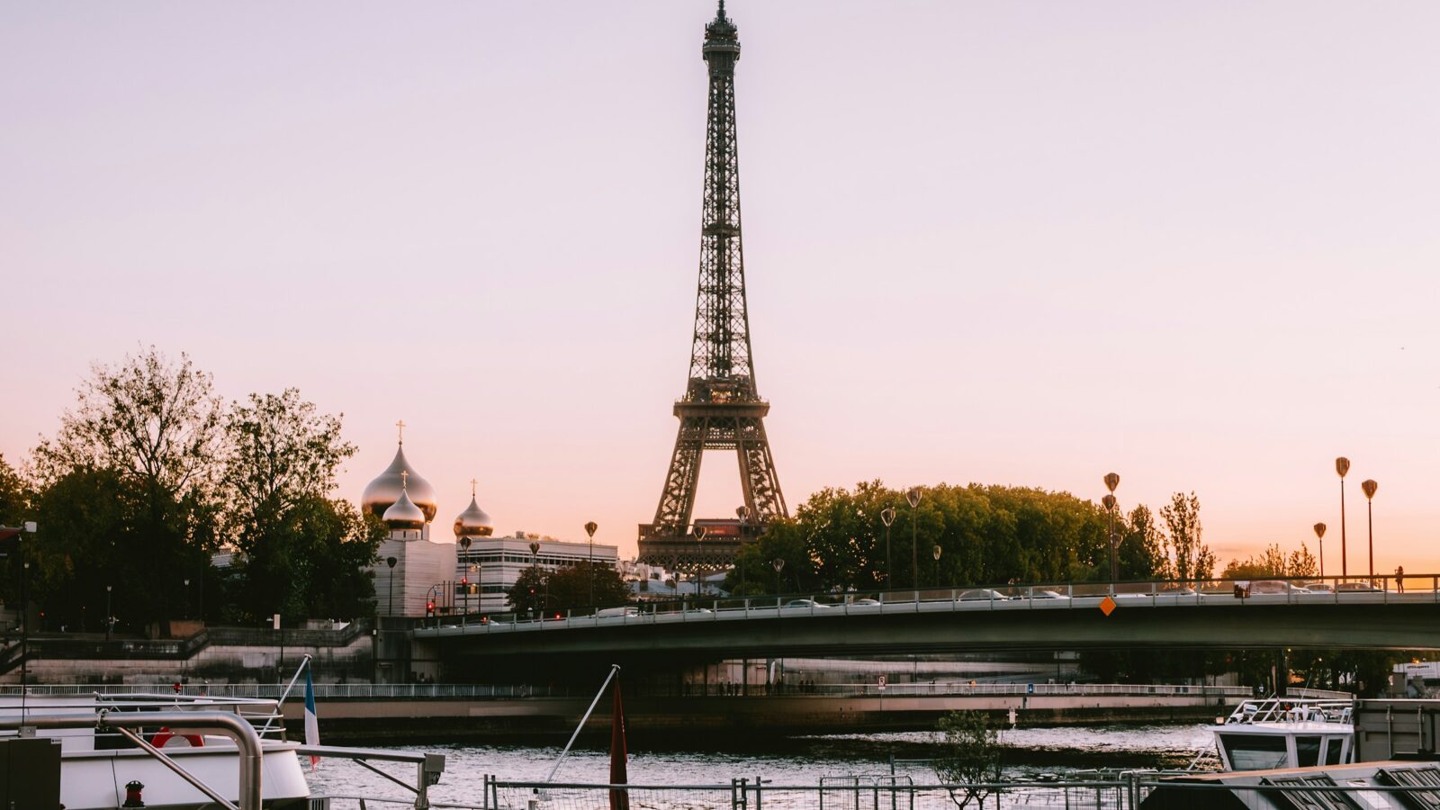 Eiffel Tower and Seine at sunset across the seasons in Paris