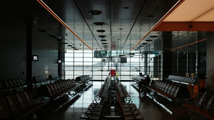France vs UAE vs Saudi Arabia vs Egypt vs UK vs USA: Six Visitor-to-Investor Systems Compared — magazine photography A refined international airport lounge representing global mobility — France vs UAE vs Saudi Arabia vs Egypt vs UK vs USA: Six Visitor-to-Investor Systems Compared