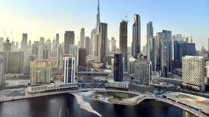 Dubai and the UAE: From Holiday Magnet to Property, Residency and Business Platform — magazine photography Dubai Business Bay skyline and Burj Khalifa waterfront — Dubai and the UAE: From Holiday Magnet to Property, Residency and Business Platform