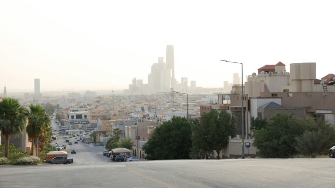 Saudi Arabia: The New Property Gateway, Premium Residency and the Limits of Reform — magazine photography Riyadh skyline, contemporary towers and palm trees — Saudi Arabia: The New Property Gateway, Premium Residency and the Limits of Reform