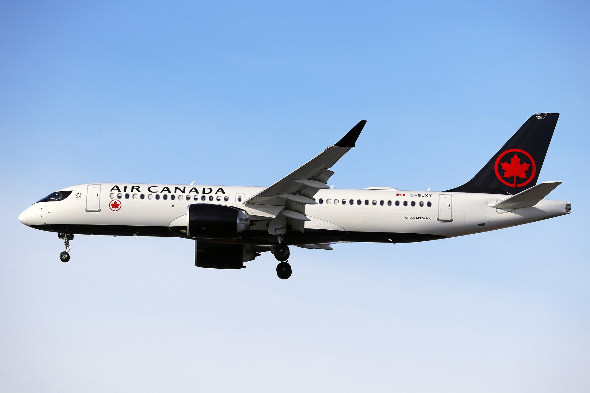 Air Canada Airbus A220-300 aircraft approaching an airport