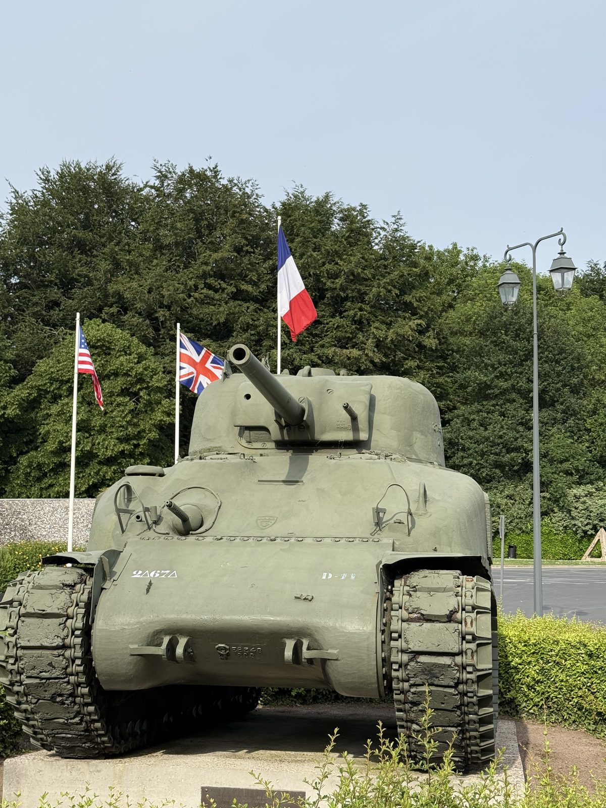 Sherman tank and Allied flags outside the Battle of Normandy Museum in Bayeux