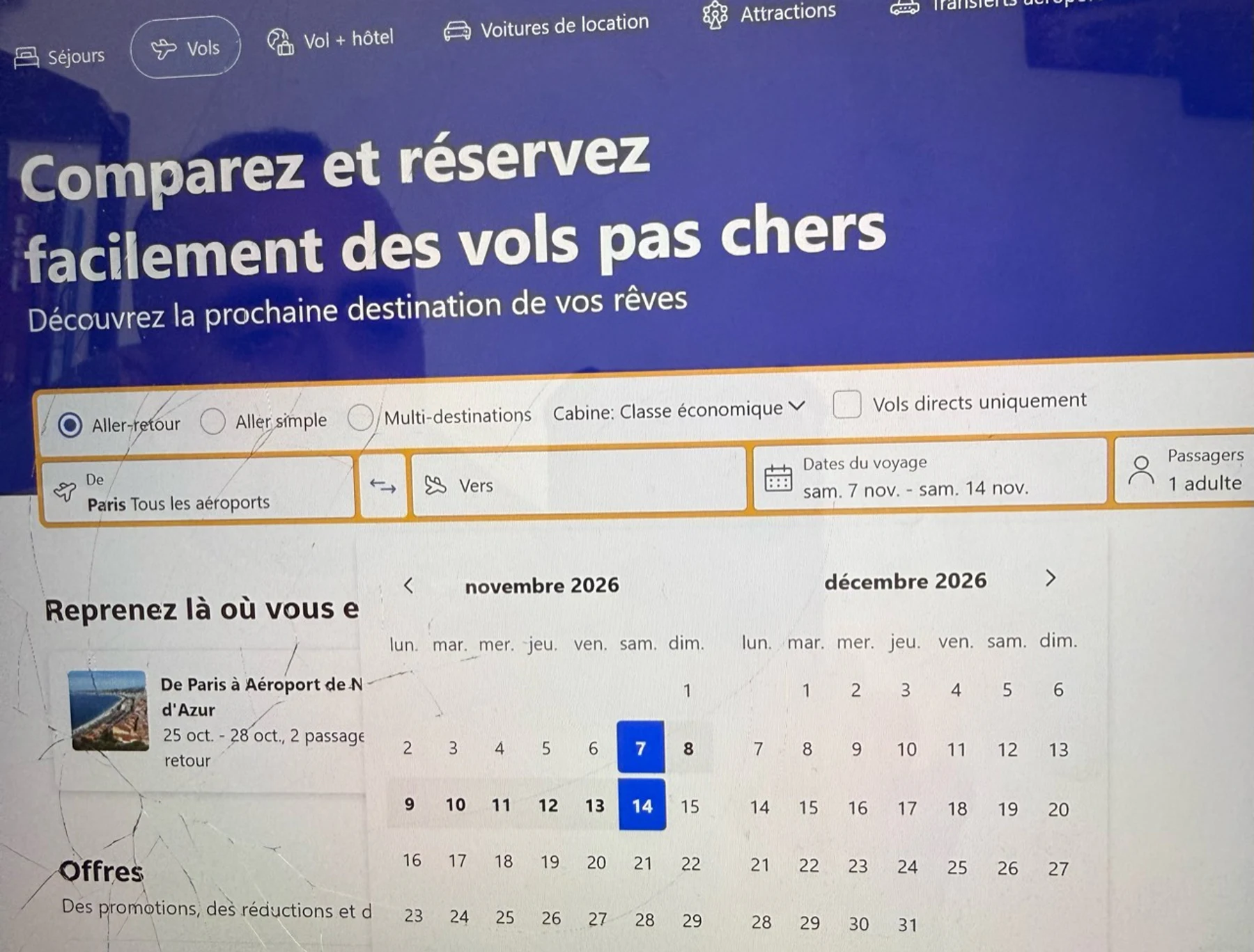 Booking.com flight calendar displaying November and December in an original reader-supplied photograph