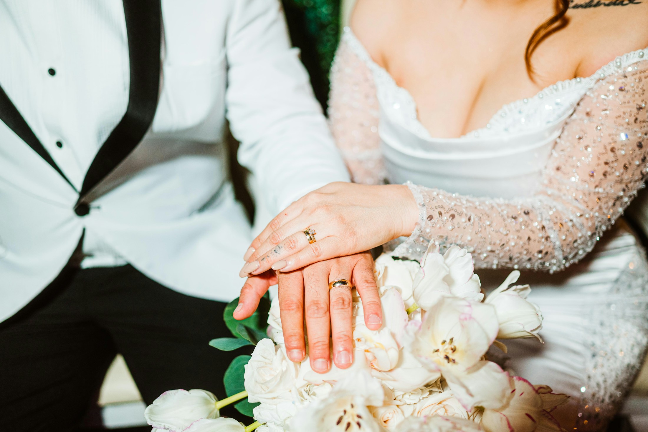 A couple exchanging wedding rings after a civil ceremony in Paris