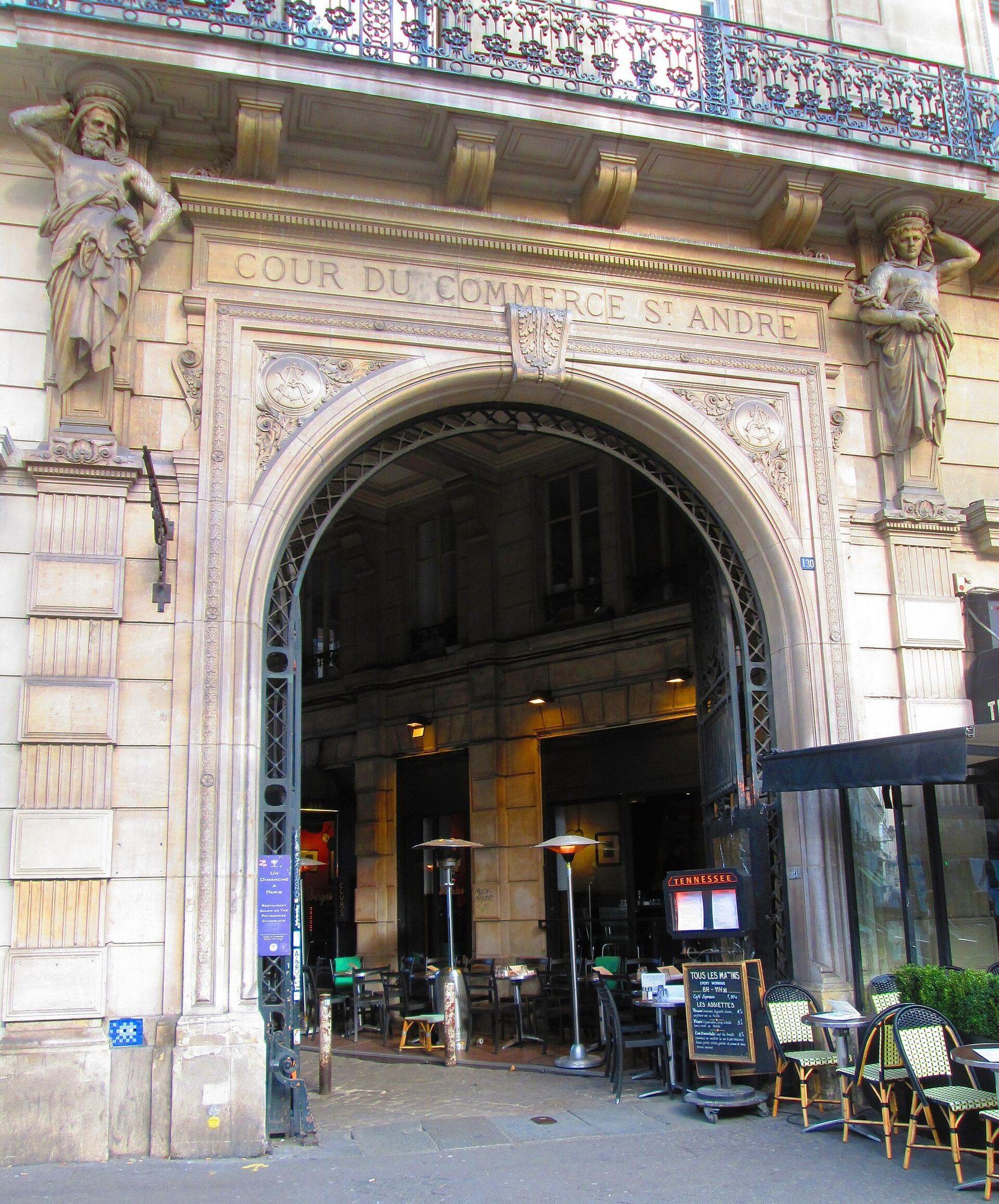 Entrance to the historic Cour du Commerce Saint-André from Boulevard Saint-Germain
