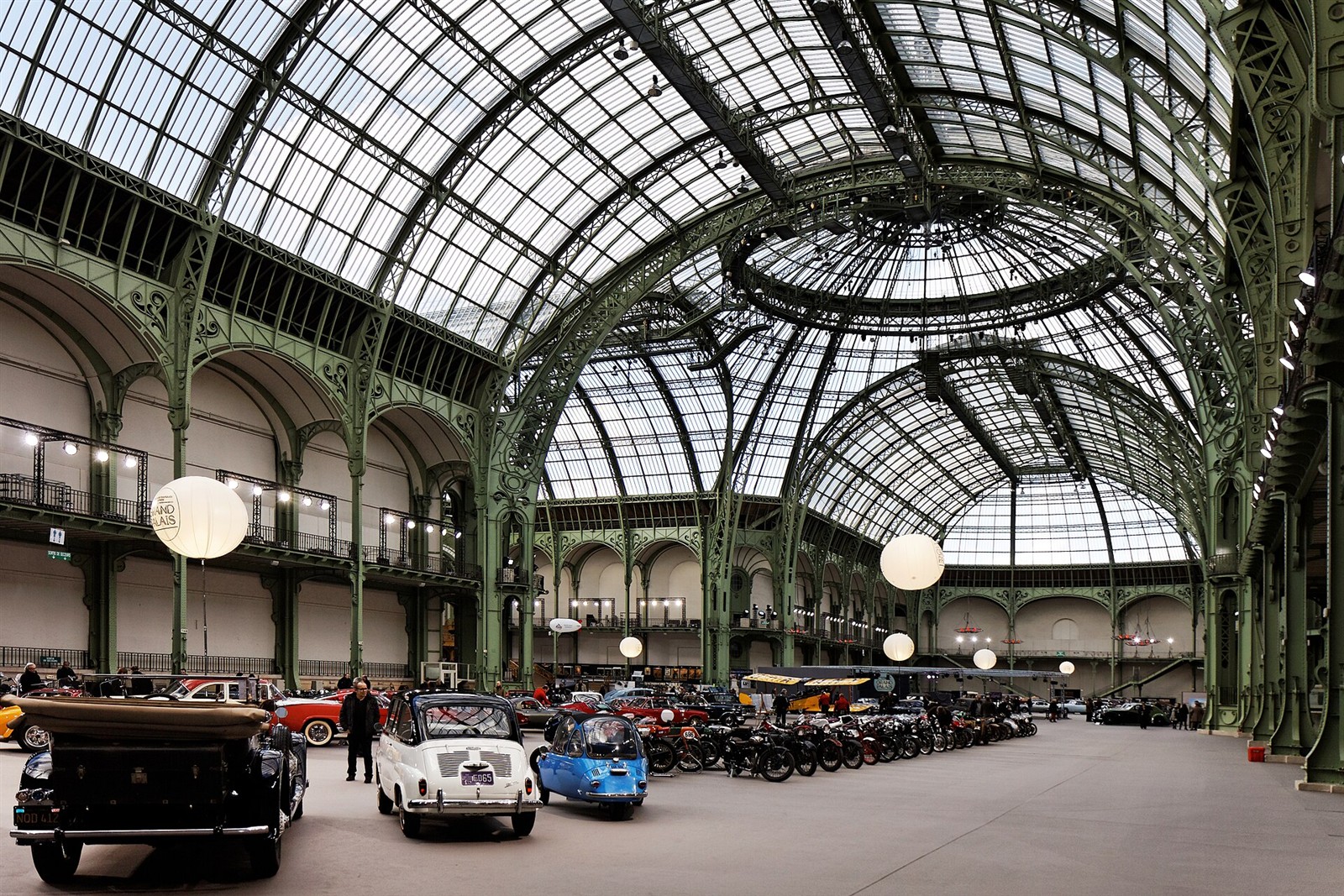 Glass roof and iron structure of the Grand Palais nave in an archive photograph
