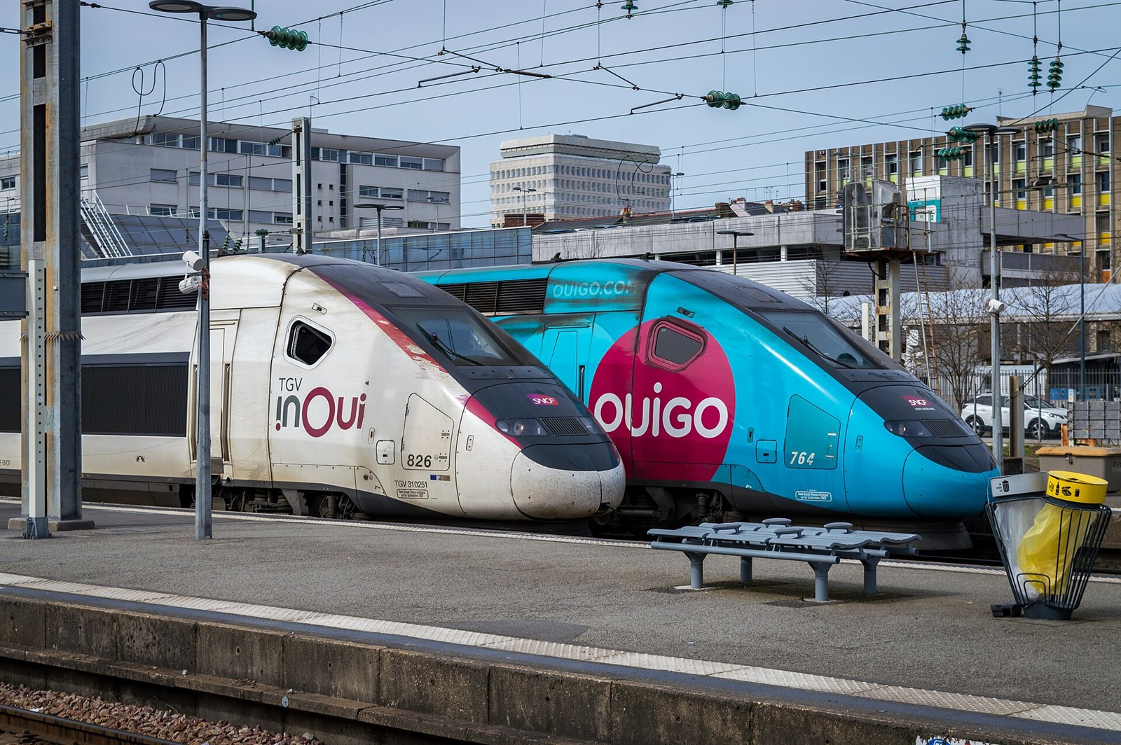 TGV INOUI and OUIGO high-speed trains side by side at Rennes station