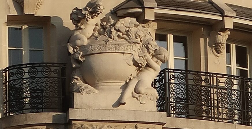Sculpted façade detail and Lutetia lettering at the hotel on boulevard Raspail
