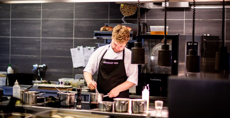 Food preparation in a professional kitchen.