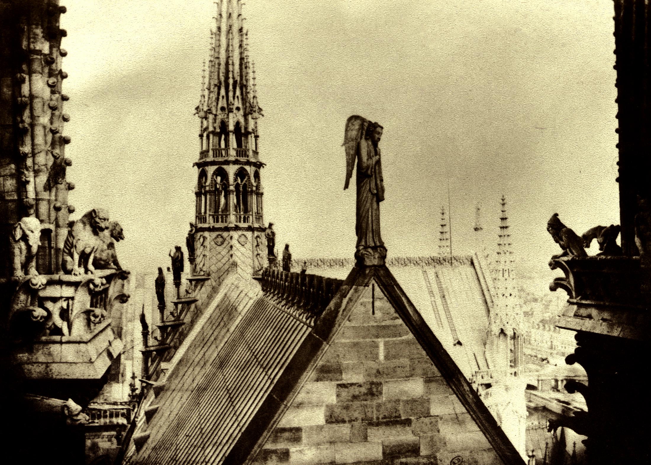 Charles Marville photograph of the new Viollet-le-Duc spire rising above Notre-Dame de Paris in 1865