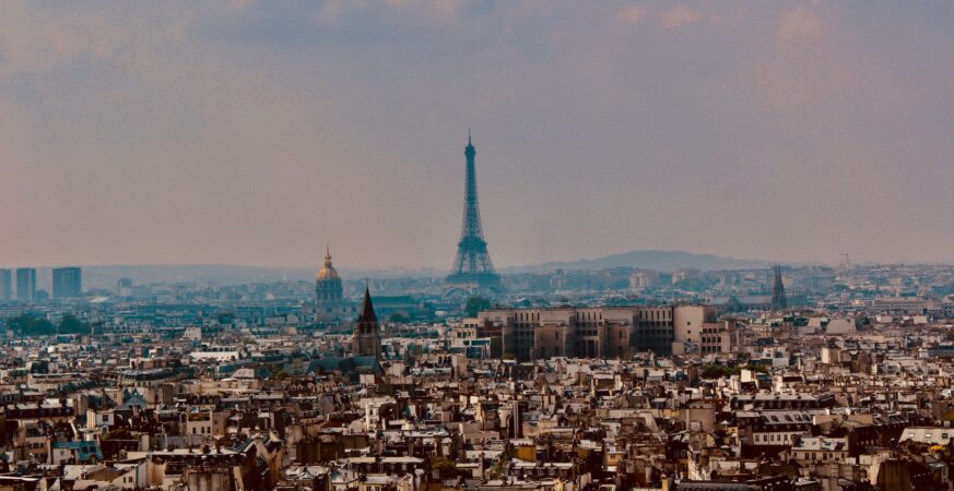 Paris rooftops and the Eiffel Tower viewed across the city