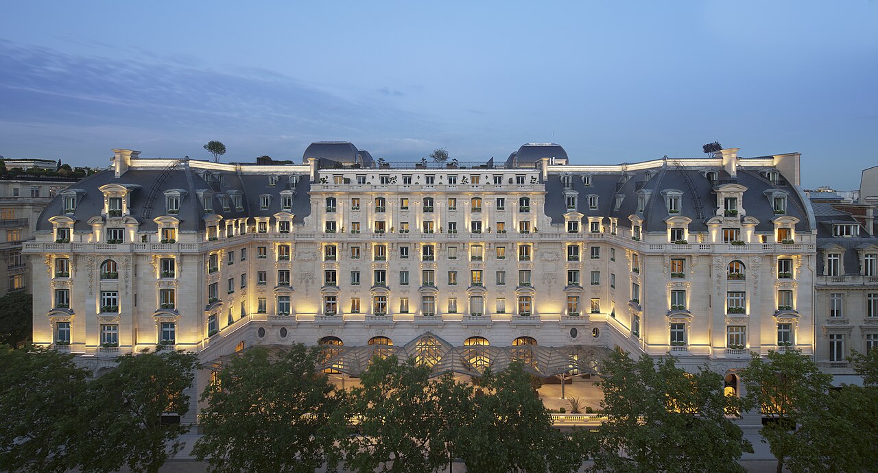 The Peninsula Paris full Beaux-Arts façade on Avenue Kléber at blue hour