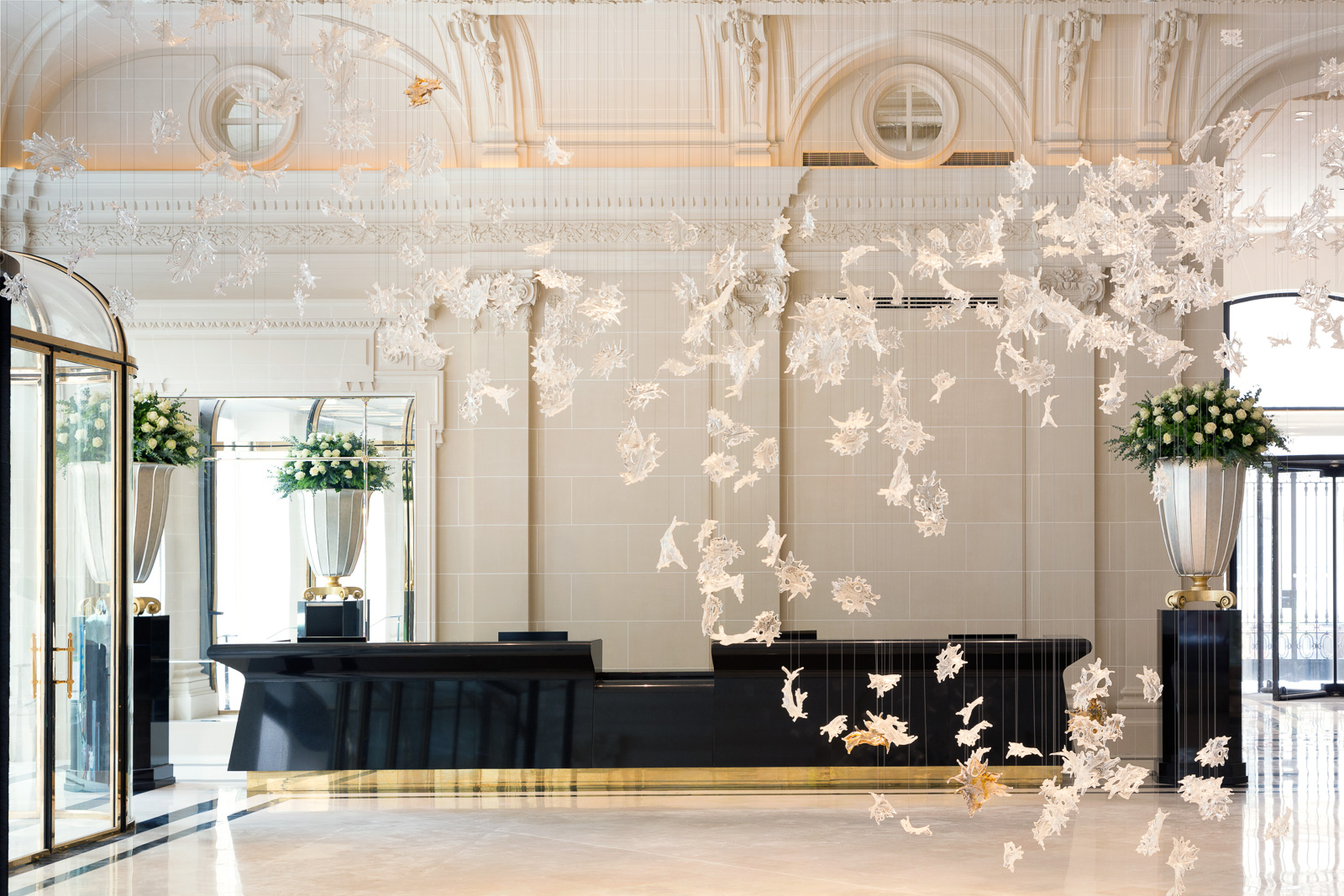 The restored Lobby of The Peninsula Paris with hand-blown crystal installation