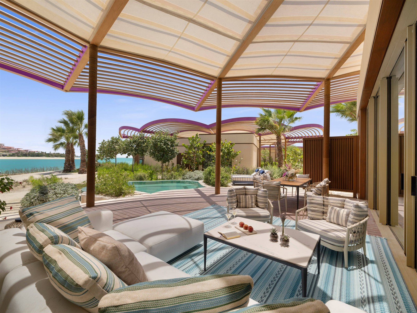 Raffles The Red Sea furnished villa terrace beside a private pool and the sea