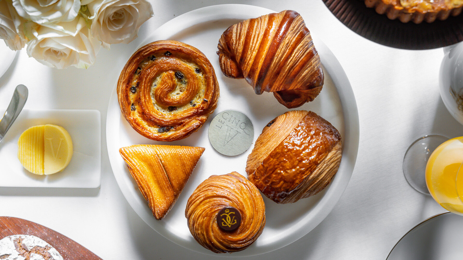 Golden croissants and French viennoiseries at Le Cinq in Paris