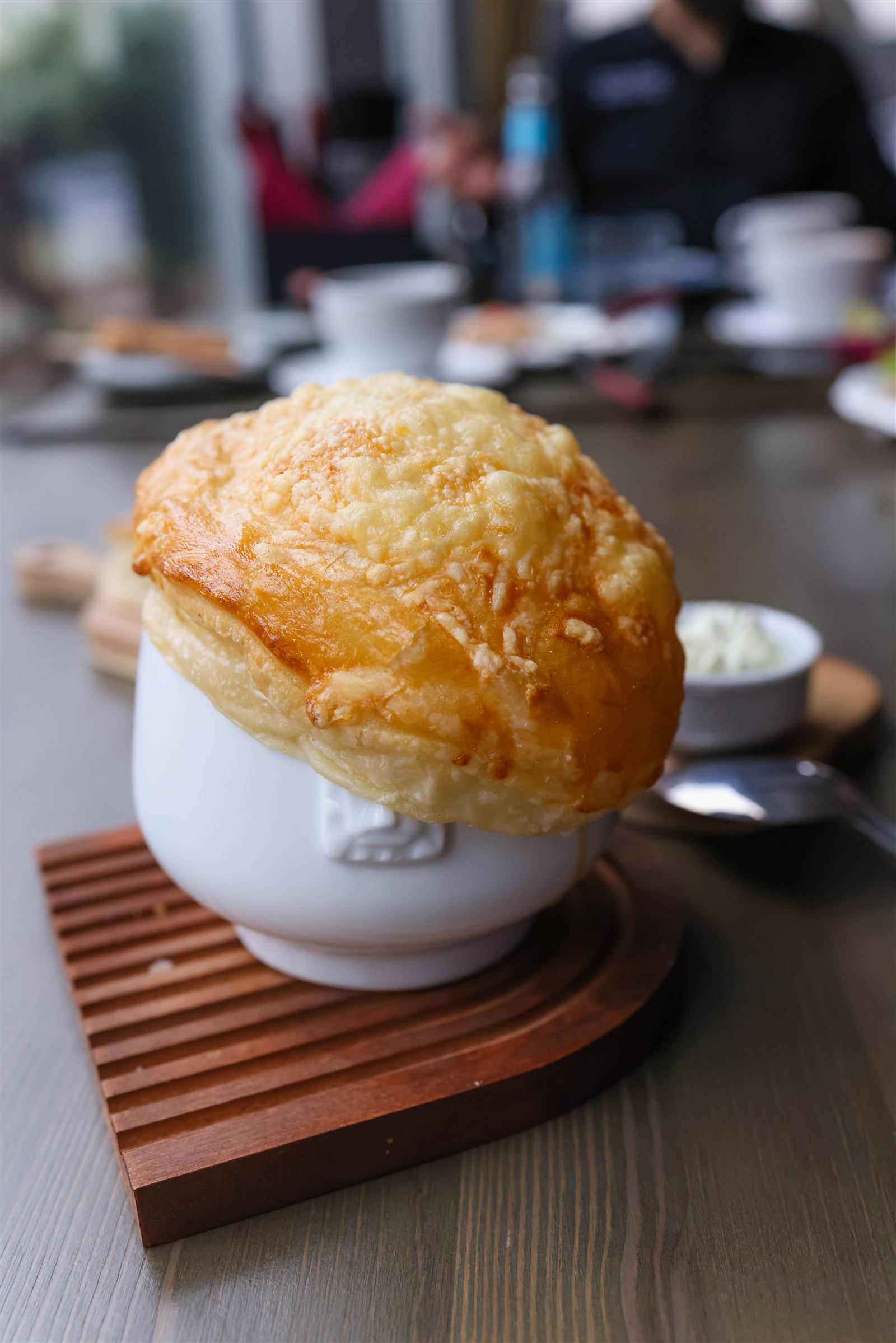 French onion soup beneath a golden cheese crust